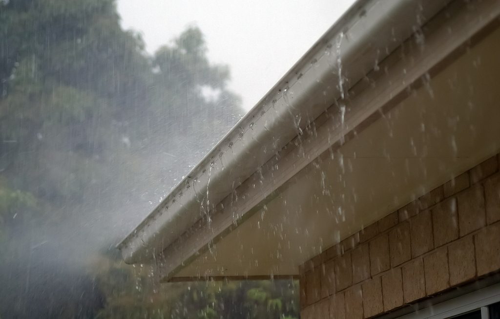 overflowing rain gutters cda