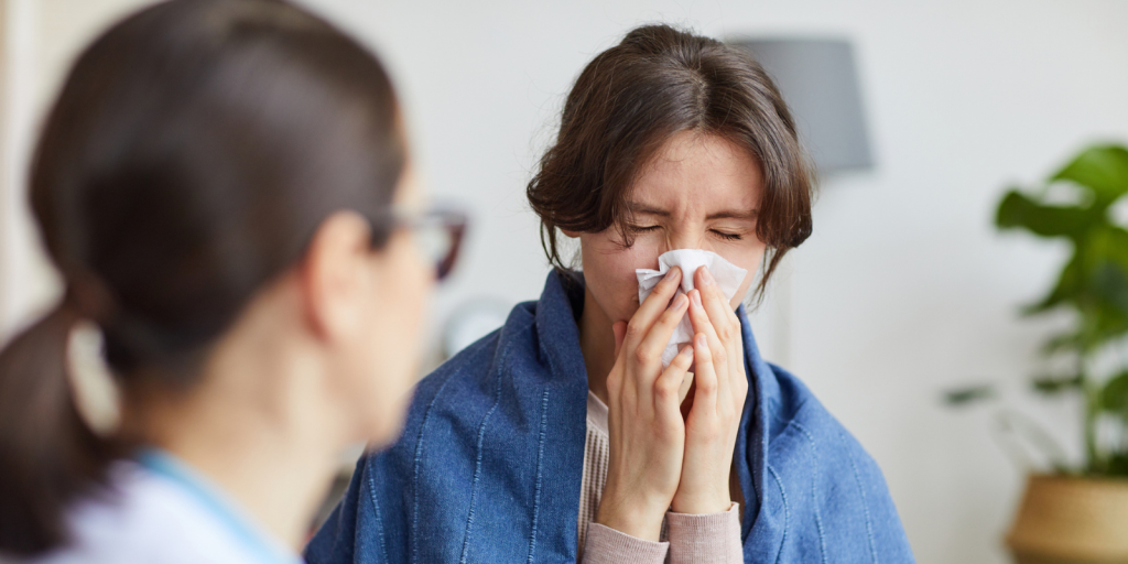 Adult Sneezing, an example of a sign for mold growth in home